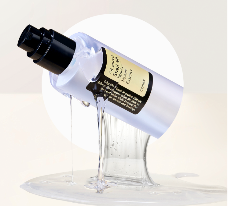 COSRX Advanced Snail 96 Mucin Power Essence bottle with essence pouring out